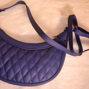 Quilted leather moon shaped Blue sling bag
