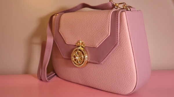 Pink hand bag with round dial