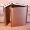 Triple fold brown wallet