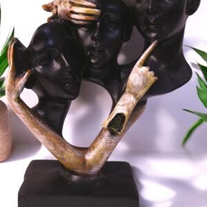 This Abstract Three Faces on single stand Sculpture is a striking representation of wisdom and perception, inspired by the classic 