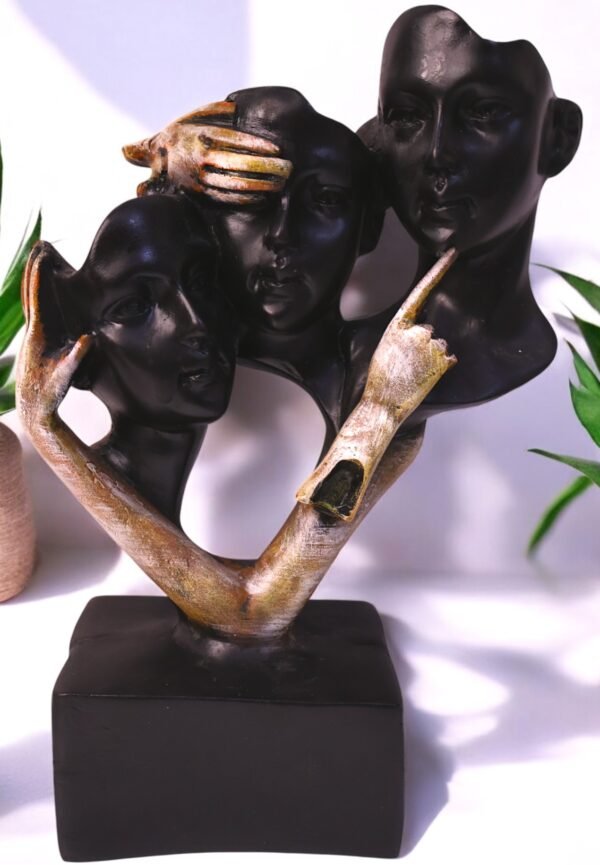 This Abstract Three Faces on single stand Sculpture is a striking representation of wisdom and perception, inspired by the classic "See No Evil, Hear No Evil, Speak No Evil" philosophy and made up of polyresin.