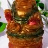 Polyresin small size multicolor laughing Buddha statue.