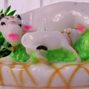 Cow and calf made up of marble dust.