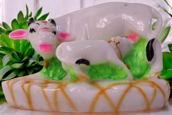 Cow and calf made up of marble dust.