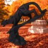 Sculpture of a black panther descending on a rock. ideal for gifting and decoration