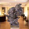 Couple face carved in leaves made up of polyresin