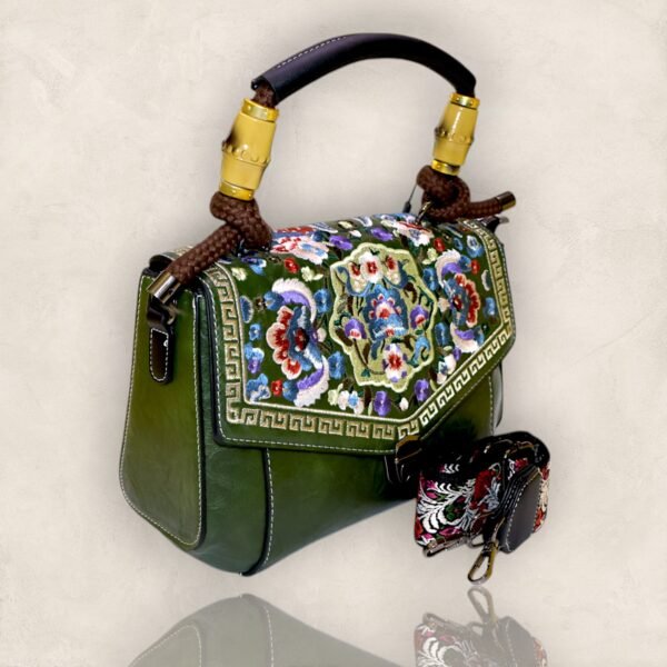 Exquisite embroidered handbag in a rich green hue