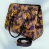 Exquisite Golden Magenta Embossed Handbag with Optional Shoulder Sling