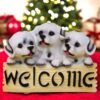 Three welcome puppies made up of polyresin