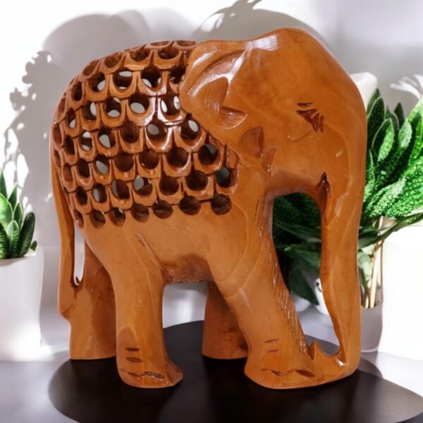 Wood elephant carved from single piece of wood