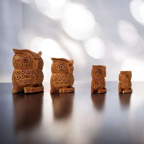 Four of Three Owls carved from the wood with excellent mesh work.
