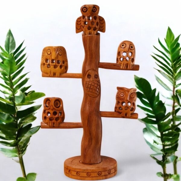 Set of five small owl sitting on the branches
