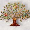 A metal tree decor with colorful leaves and butterfly.
