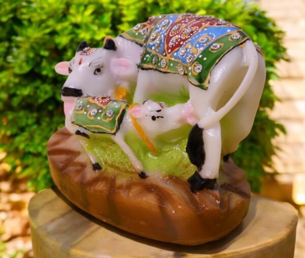 Cow and calf made up of marble dust.