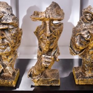 Three golden wise face polyresin statue